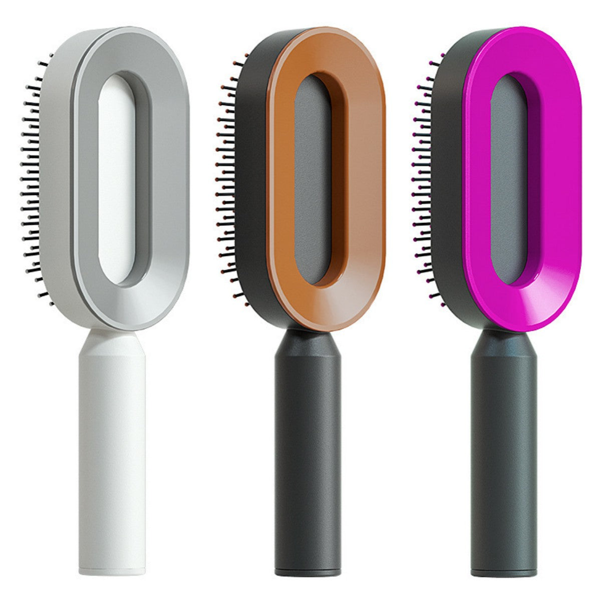 Three pet grooming brushes with different colored handles on a white background